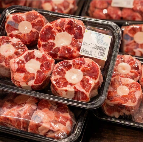 Excel Meats oxtail packages displayed with clear pricing and weight labels on a retail shelf