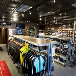 Exterior view of the Excel Sports cycling retail store in Boulder Colorado showcasing a modern storefront and bicycle displays