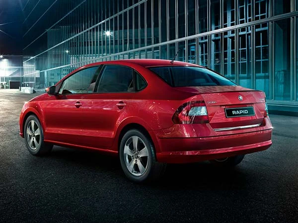 Sleek executive sedan parked on a clean modern street in India, showcasing premium design and elegant lines