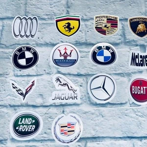 Fancy car brands logos displayed with iconic luxury emblems in a premium automotive collection