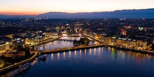 Luxury rental car traveling between Geneva and nearby European destinations