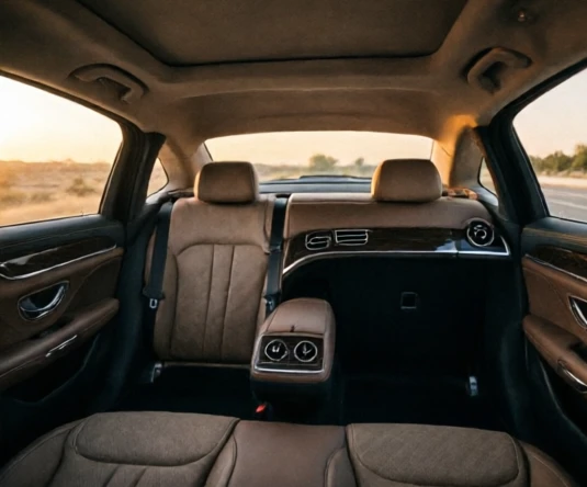 Luxury sedan interior with spacious cabin materials and practical cargo area designed for everyday usability