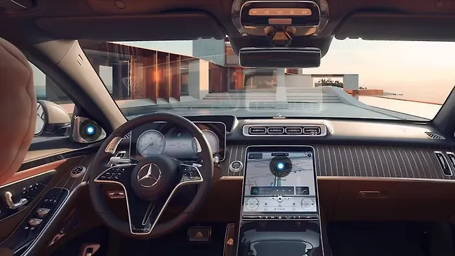 A lavish chauffeur-driven luxury car interior featuring quilted white leather seats, polished wood trim, and champagne flutes
