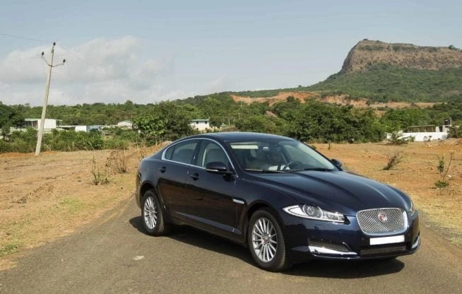 Premium monthly luxury car rental vehicle in an elegant setting for extended executive travel