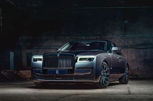 Black Badge Rolls-Royce Ghost with darker exterior trim and contrasting wheel finish parked outdoors