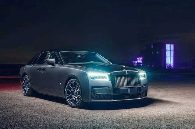 Close-up of Rolls-Royce Ghost leather seat stitching and door panel trim inside the cabin