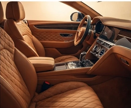 Bespoke luxury car interior with handcrafted materials and custom craftsmanship details