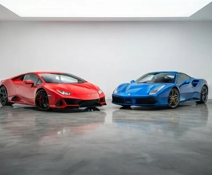 Lamborghini Huracán and Ferrari 488 GTB on display in a premium Mumbai luxury car showroom